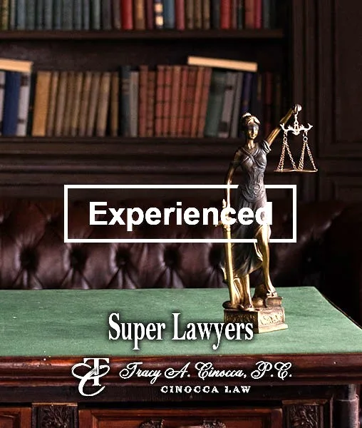 Desk Books on Shelves Lady of Justice Holding Scales Experienced letters and superlawyer logo